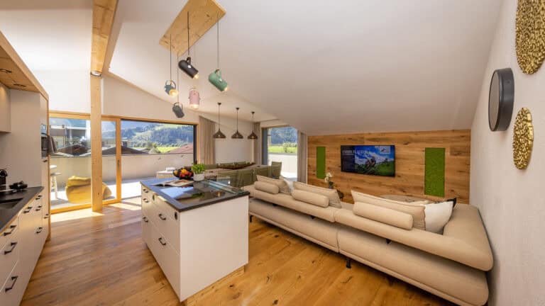 Penthouse Wohnzimmer Küche Kücheninsel Smart-TV Geschirrspüler Ausblick Gletscher