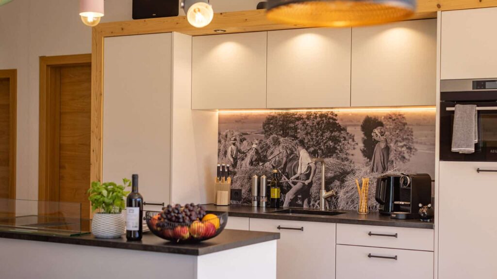 Penthouse kitchen with dishwasher, oven, electric hob and kettle