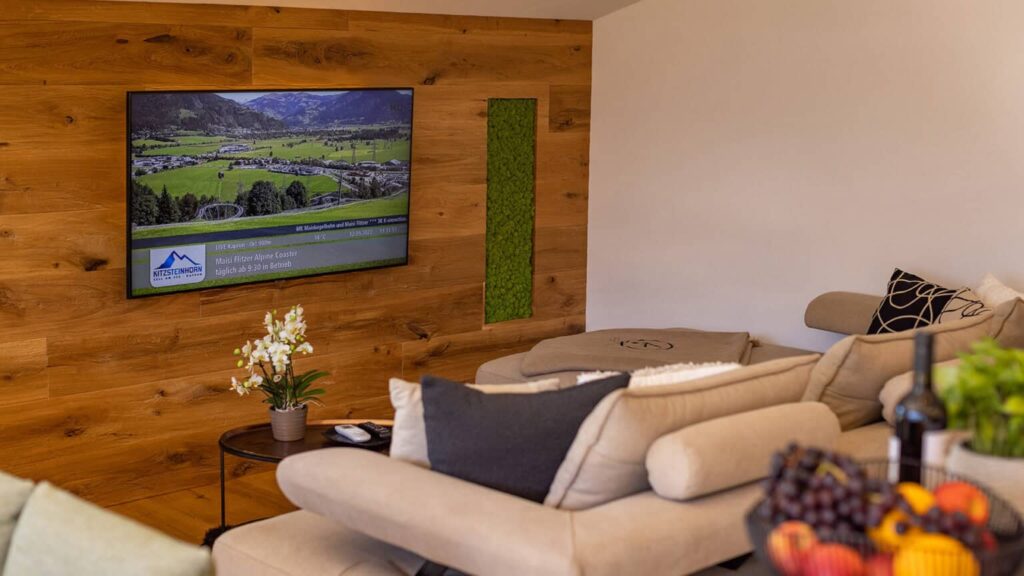 Penthouse living room with sofa and smart TV