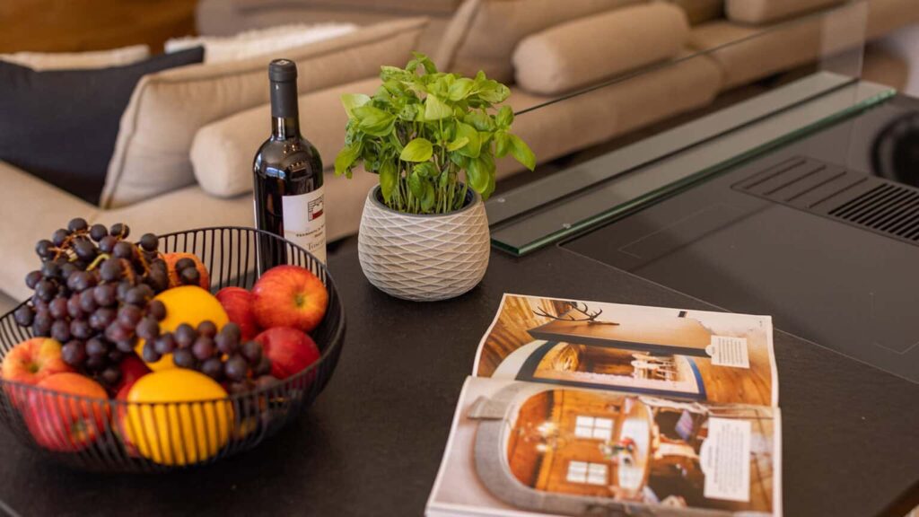 Penthouse kitchen with fruit basket and magazines